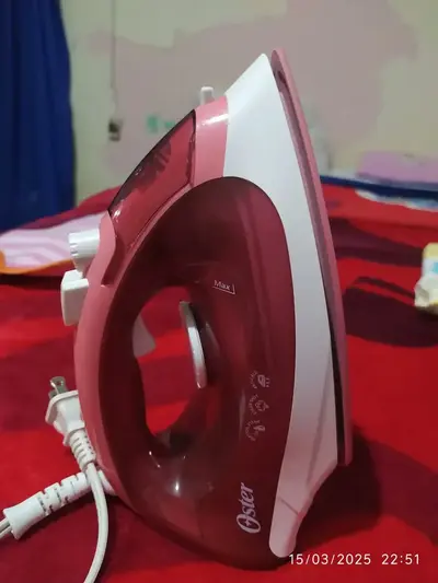 foto de Ferro de Passar a Vapor 220v Oster Rosa GCSTBS5053-057