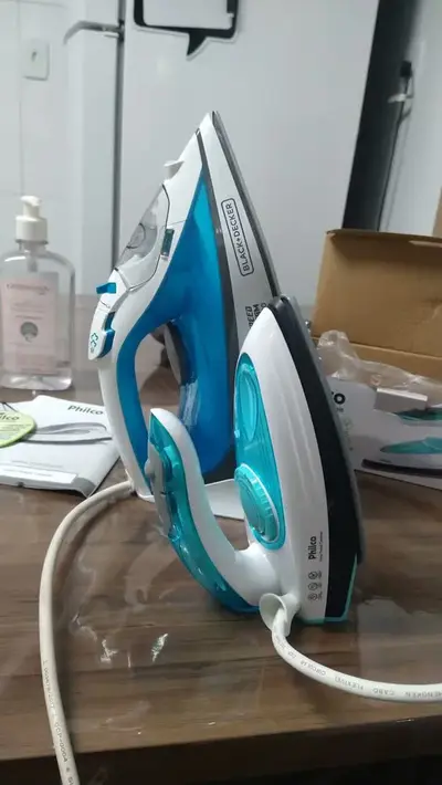 foto de Ferro De Passar Philco Travel Ceramic Vapor Extra Bivolt Azul-turquesa