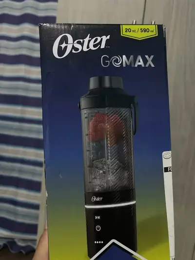 foto de Liquidificador portátil Oster, Gomax, capacidade de 590 ml