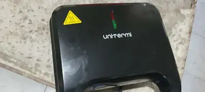 foto de Sanduicheira Elétrica Grill Unitemmi Preto Antiaderente 750W