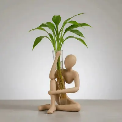 foto de Vaso Decorativo Pensador Com Tubo De Vidro Para Plantas Cor Marrom-claro Areia